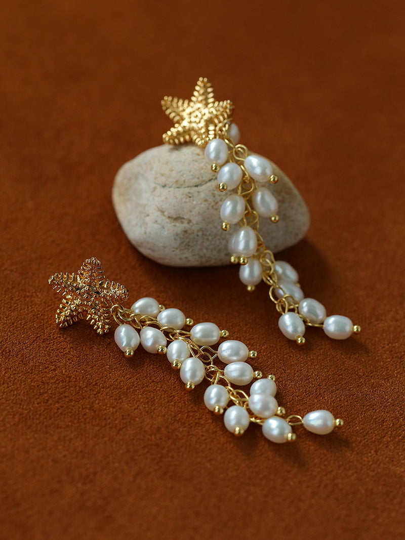 Textured starfish earrings with cascading pearl strands