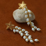 Textured starfish earrings with cascading pearl strands