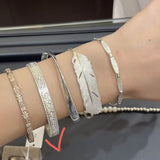 Embossed Feather Wide Open Bracelet