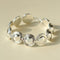 Close-up of silver oval dome bracelet links