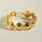 Close-up of gold oval dome bracelet links