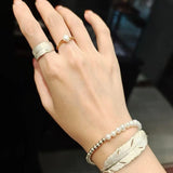 Embossed Feather Wide Open Bracelet