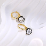 Black & Gold Moissanite Earrings - scale view | Floysun