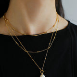 Effervescent Elegance: Singular Beaded Chain Necklace