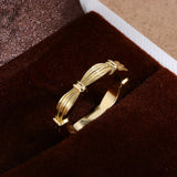Sculpted ribbon wrap ring - side profile