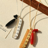 Carved Agate Comb Pendant Necklace