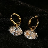 Gold-tone huggie earrings with clear oval cubic zirconia drops