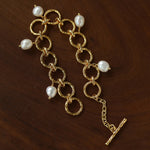 Adjustable gold-tone circle link bracelet with pearl charms