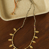 Vintage Leaf Multi‑Charm Pyrite Hand‑Strung Necklace