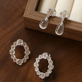 Morning Dew Clear Quartz Drop Earrings - Floral Studs with Purple Zirconia