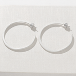Sculptural white C-hoop statement earrings in 925 sterling silver