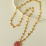 Eternal Bloom Long Necklace | Carved Strawberry Quartz Donut on Filigree Chain - floysun