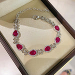 Exquisite Ruby Teardrop & Diamond Bracelet with Four - Leaf Clover Accents - floysun