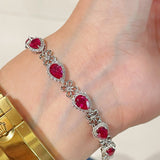Exquisite Ruby Teardrop & Diamond Bracelet with Four - Leaf Clover Accents - floysun