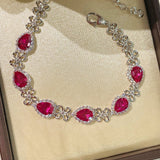 Exquisite Ruby Teardrop & Diamond Bracelet with Four - Leaf Clover Accents - floysun