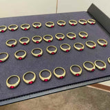 Seamless Wrap Half-Bezel Oval Lab Ruby Ring
