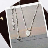Original Design Embracing Heart Pendant Necklace