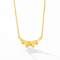Gold ruffle pendant and chain on white background