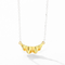 Gold ruffle pendant with silver-tone chain