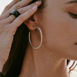 Sculptural white C-hoop statement earrings in 925 sterling silver