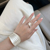 Sculptural white ripple adjustable open ring in 925 sterling silver