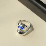 Liquid Light Teardrop Crossover Ring – Silver & Blue Glass - floysun