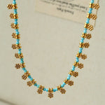 Mini Faceted Turquoise Bead Necklace with Gold Flower Pendant - floysun