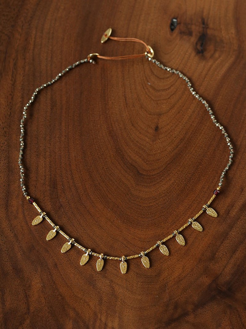 Gold-plated pyrite collarbone necklace by Floysun