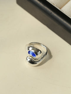 Liquid Light Teardrop Crossover Ring – Silver & Blue Glass