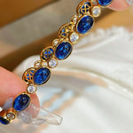 Vintage-inspired oval synthetic sapphire tennis bracelet