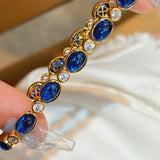 Vintage-inspired oval synthetic sapphire tennis bracelet