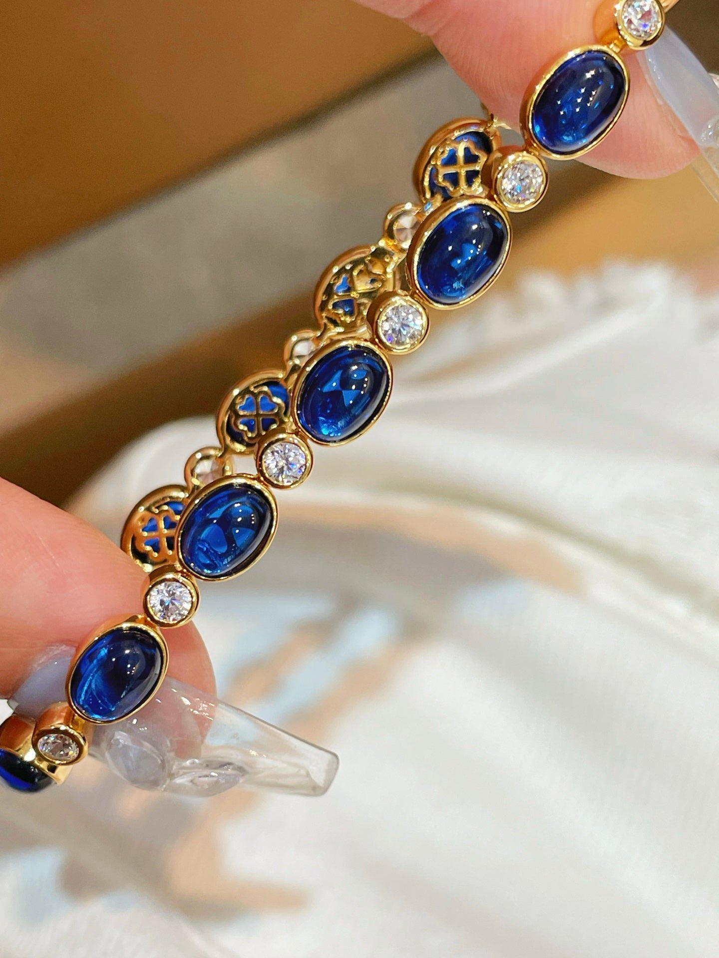 Vintage-inspired oval synthetic sapphire tennis bracelet
