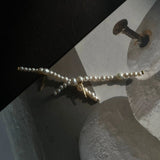 Graduated Pearl Linear Earrings