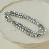 Elegance in Layers：Triple-Layer Gray Pearl Necklace