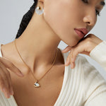 Graceful Flutter: The Ethereal Mother-of-Pearl Skirt Pendant Necklace - floysun